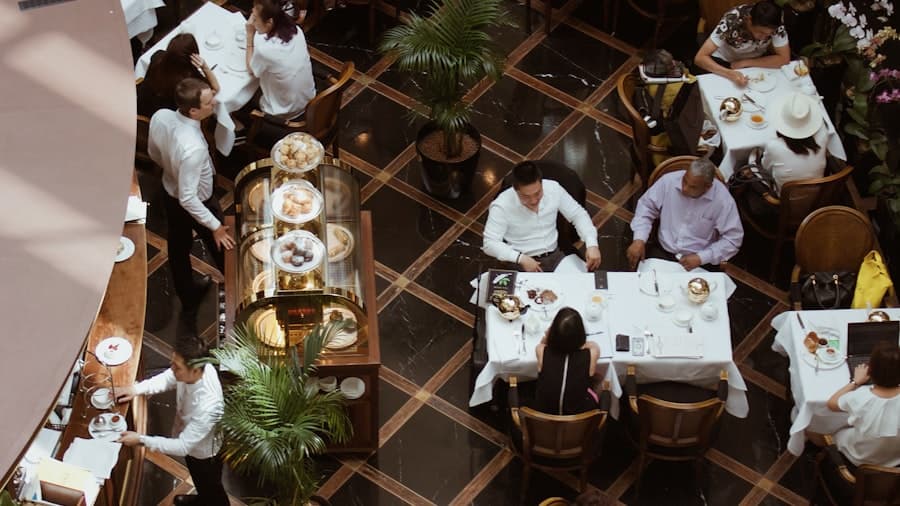 Wait staff serving guests in a busy restaurant